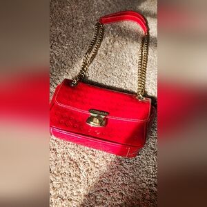 Elegant Red Shoulder Bag with Gold Accents